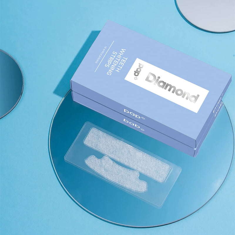 Pakkaus ja PAP+ hampaiden valkaisuliuskat Diamond Smile