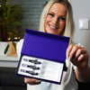 Nainen, jolla on Diamond Smile violetti värinkorjaus hampaiden valkaisugeeli